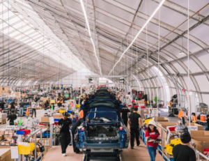 tesla production line is under a tent on the desert